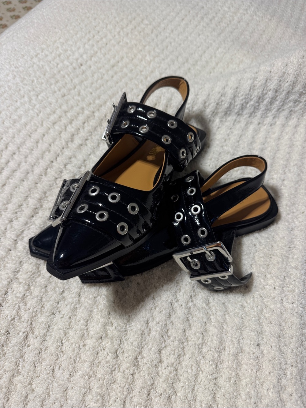 Patent leather eyelet flats